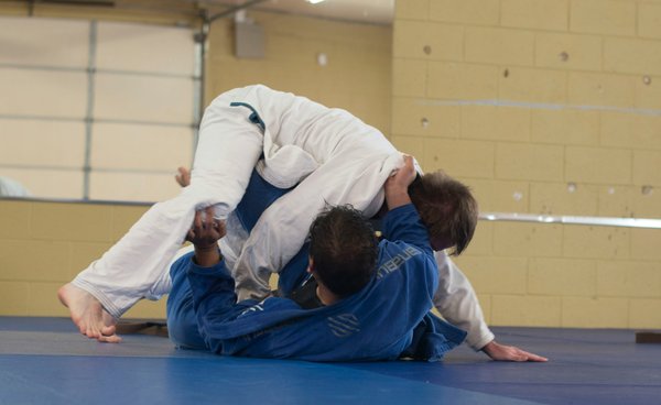 What are the benefits of cross-training in different martial arts for UK athletes?